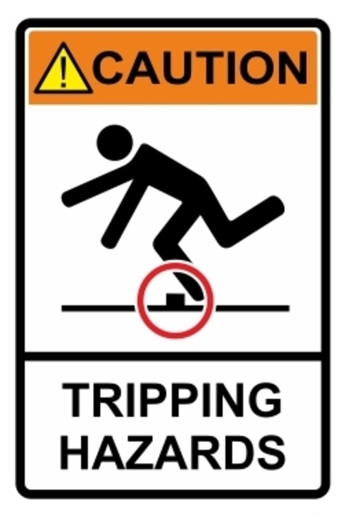 Tripping hazards, warning sign. Construction industry safety.